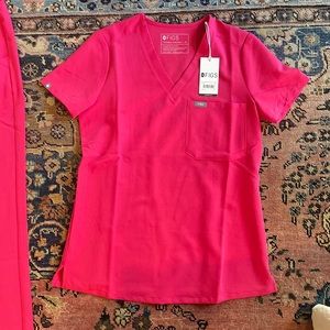 figs shocking pink scrubs, never worn tags still on, xs in both top and joggers